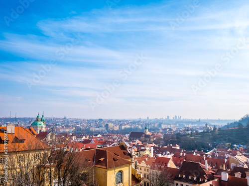 Prague Czech Republic cityscape view blue sky orange roof space old town building landmark historical city.