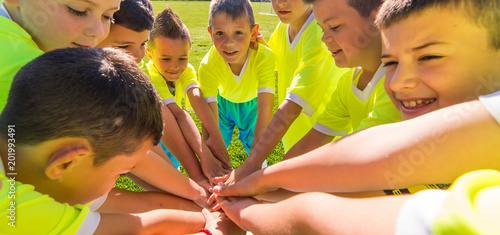 Kids soccer football -  children in hudle photo