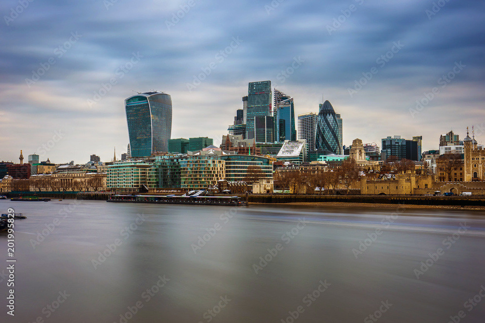 Fototapeta premium London, England - Bank district, London's most famous financial district and the Tower of London with famous skyscrapers on a cloudy morning