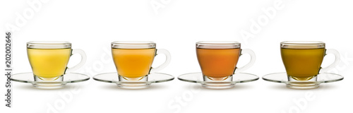 variety of tea and herbal teas in glass cups on white background