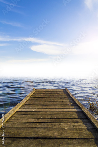 Fantastic view of the wooden pier in the lake. Scenery background