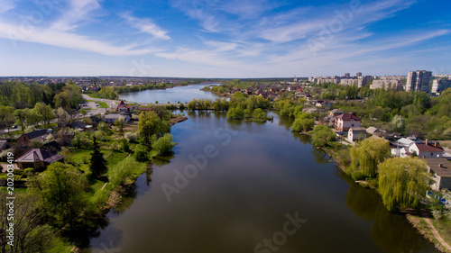 Aerial view of lake in the city. Spring.