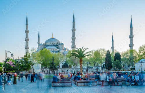Photography people sit in front of Sultanahmet Mosque