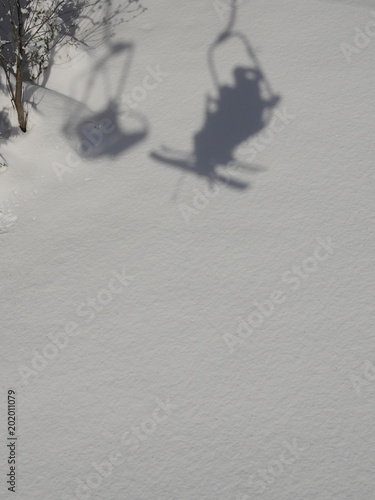 Shadow of chair lift