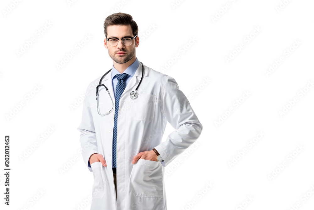 Confident male doctor wearing white coat with stethoscope isolated on white Confident male doctor wearing white coat with stethoscope isolated on white