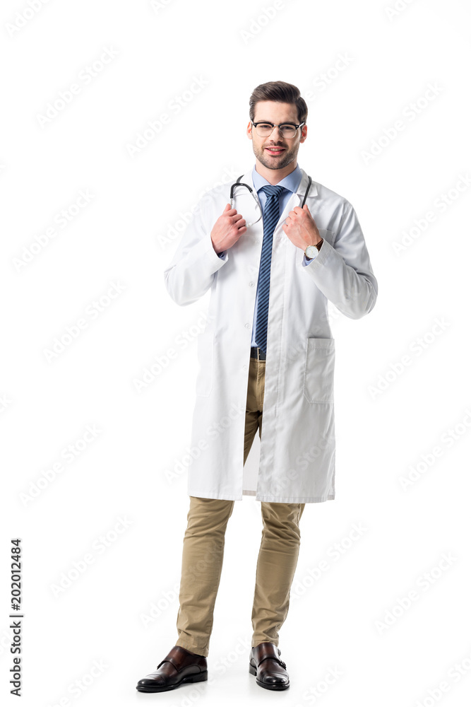 Male doctor wearing white coat with stethoscope isolated on white Male doctor wearing white coat with stethoscope isolated on white
