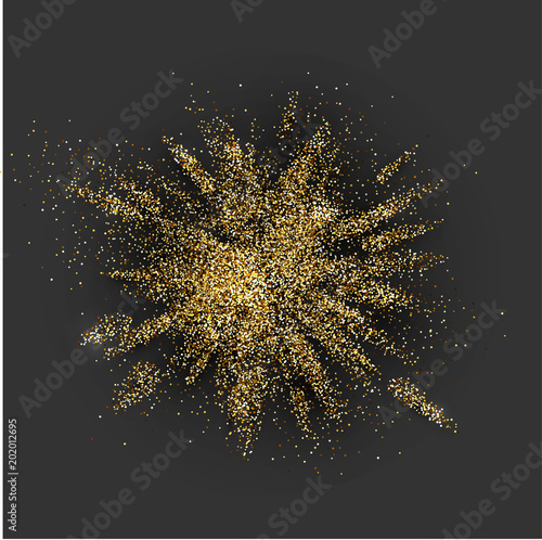 Golden glitter explosion on grey.