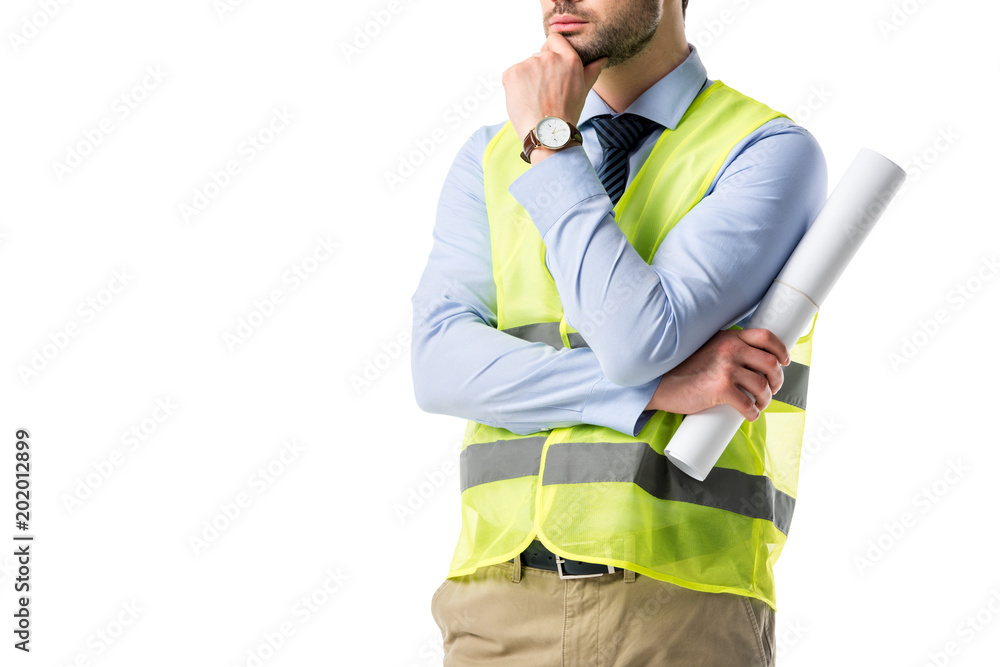 Thoughtful builder in reflective vest holding blueprint isolated on white Thoughtful builder in reflective vest holding blueprint isolated on white