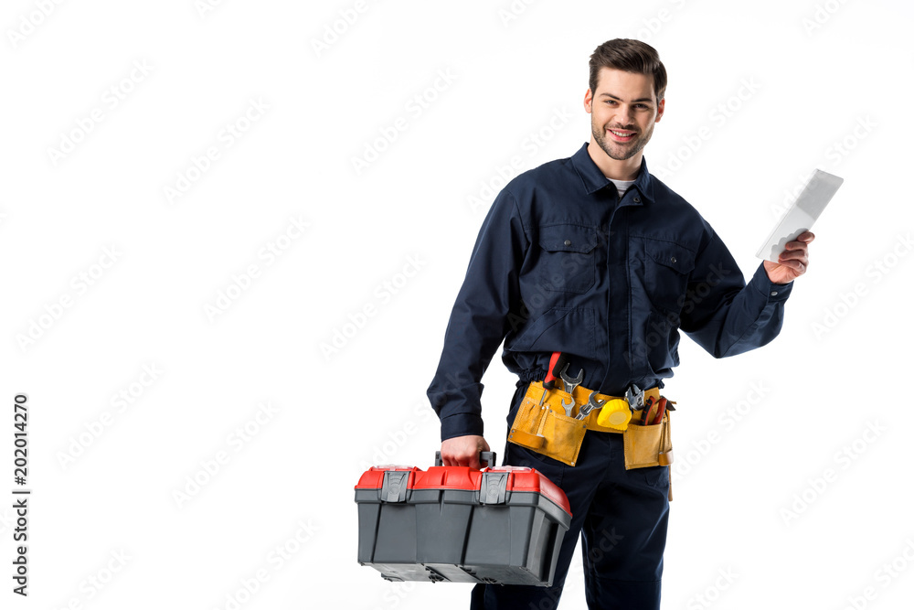 portrait of smiling plumber in uniform with tool box and digital tablet isolated on white portrait of smiling plumber in uniform with tool box and digital tablet isolated on white