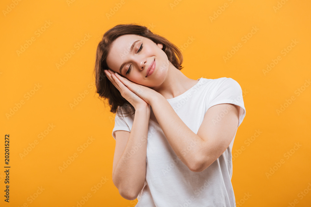Sleeping cute young lady standing isolated Sleeping cute young lady standing isolated