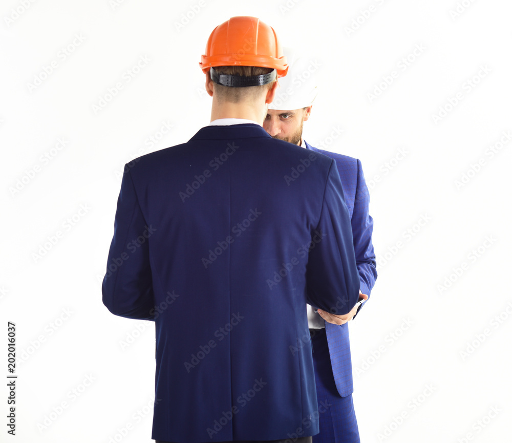 Engineers at meeting, back view. Engineers at meeting, back view.