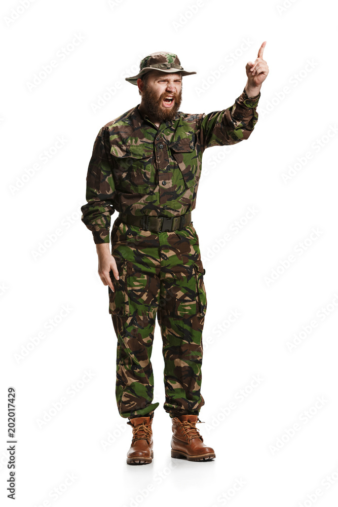 Young army soldier wearing camouflage uniform isolated on white Young army soldier wearing camouflage uniform isolated on white
