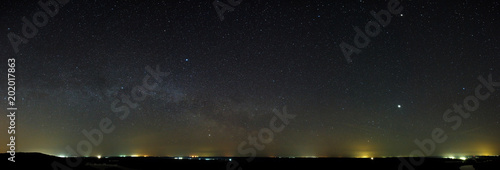 Night sky with the stars of the Milky Way galaxy. Panoramic view of the starry space.