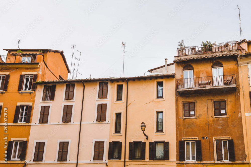 old orange buildings in Rome, Italy