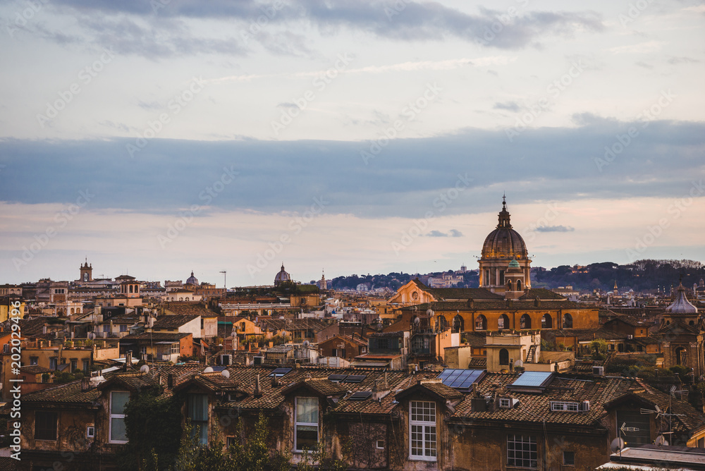 view of St Peters Basilica and buildings in Rome, Italy