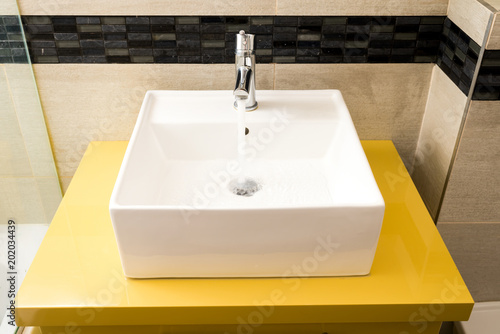 modern washbasin on the pedestal in the bathroom