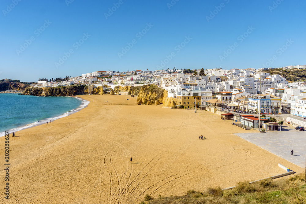 Amazingly wide, almost empty Fishermen Beach in Albufeira, Algarve, Portugal