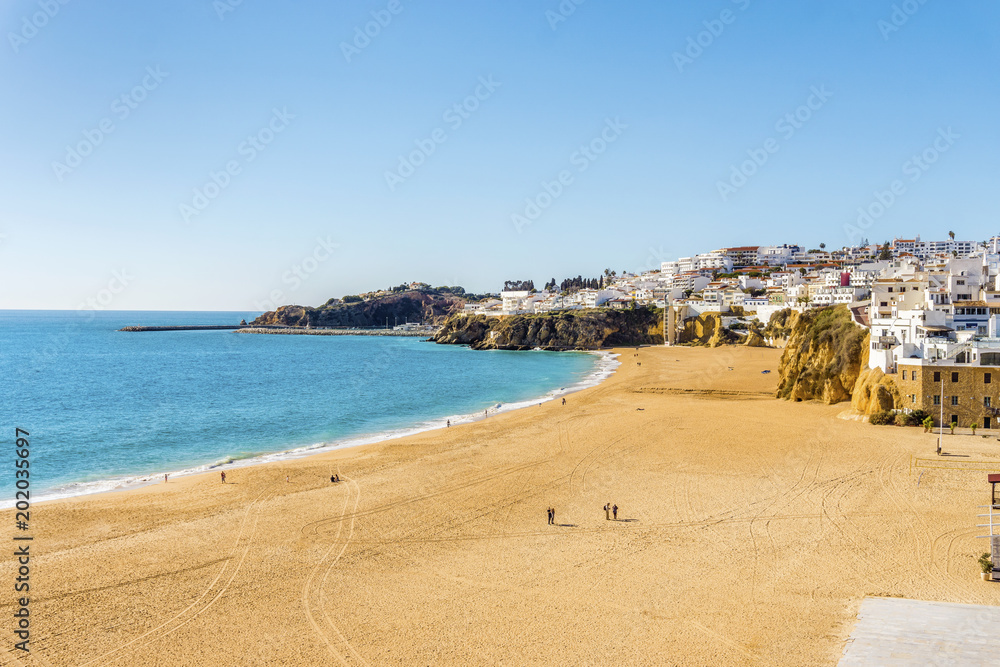 Amazingly wide, almost empty Fishermen Beach in Albufeira, Algarve, Portugal