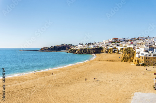 Amazingly wide, almost empty Fishermen Beach in Albufeira, Algarve, Portugal © malajscy