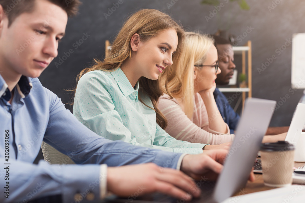 Programmers working in software developing company Programmers working in software developing company