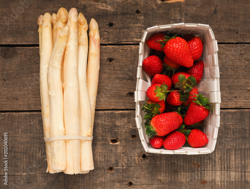 Fresh organic strawberries and white asparagus