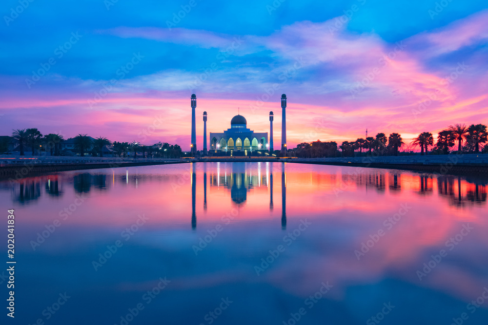 beautiful reflection mosque building shot during sunset or sunrise 