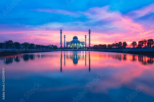beautiful reflection mosque building shot during sunset or sunrise 