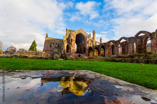 Ruins of Melrose Abbey in the Scottish Borders region in Scotland photo