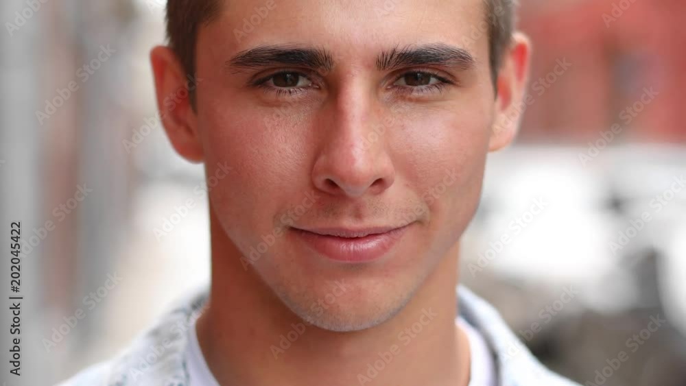 Close-up portrait of smiling cute caucasian man Close-up portrait of smiling cute caucasian man