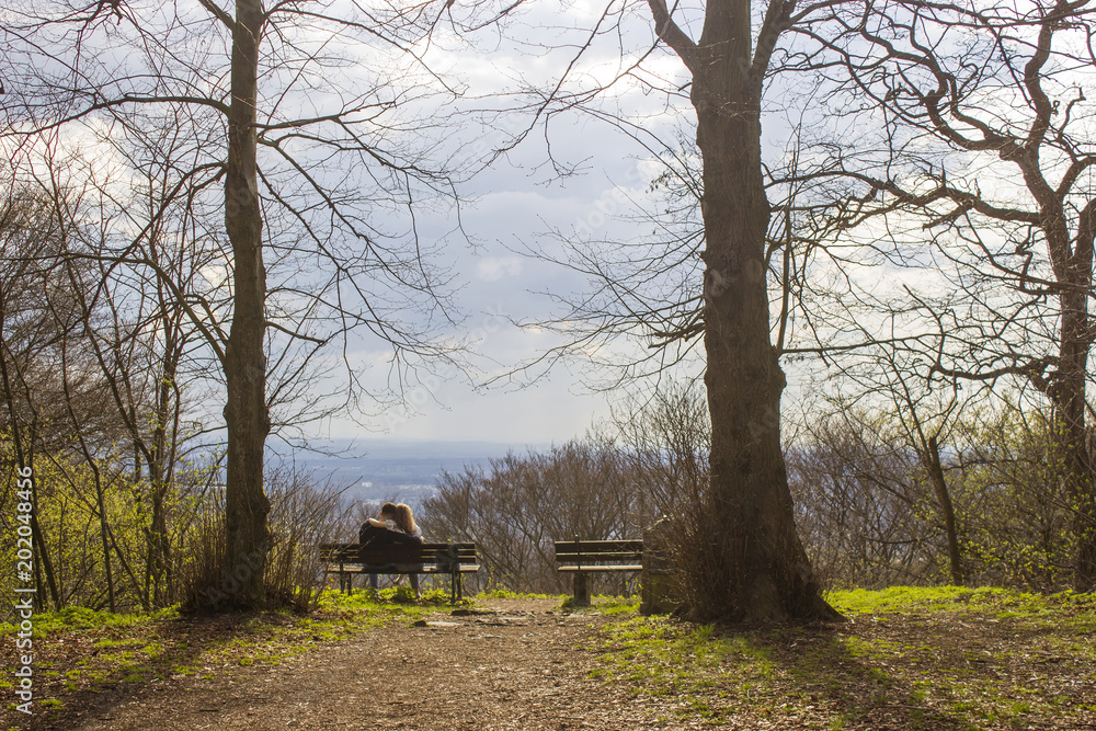 Couple on the bench in Siebengebirge, Germany Couple on the bench in Siebengebirge, Germany