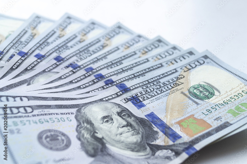 Dollars, closeup photo of one hundred dollar banknotes Dollars, closeup photo of one hundred dollar banknotes