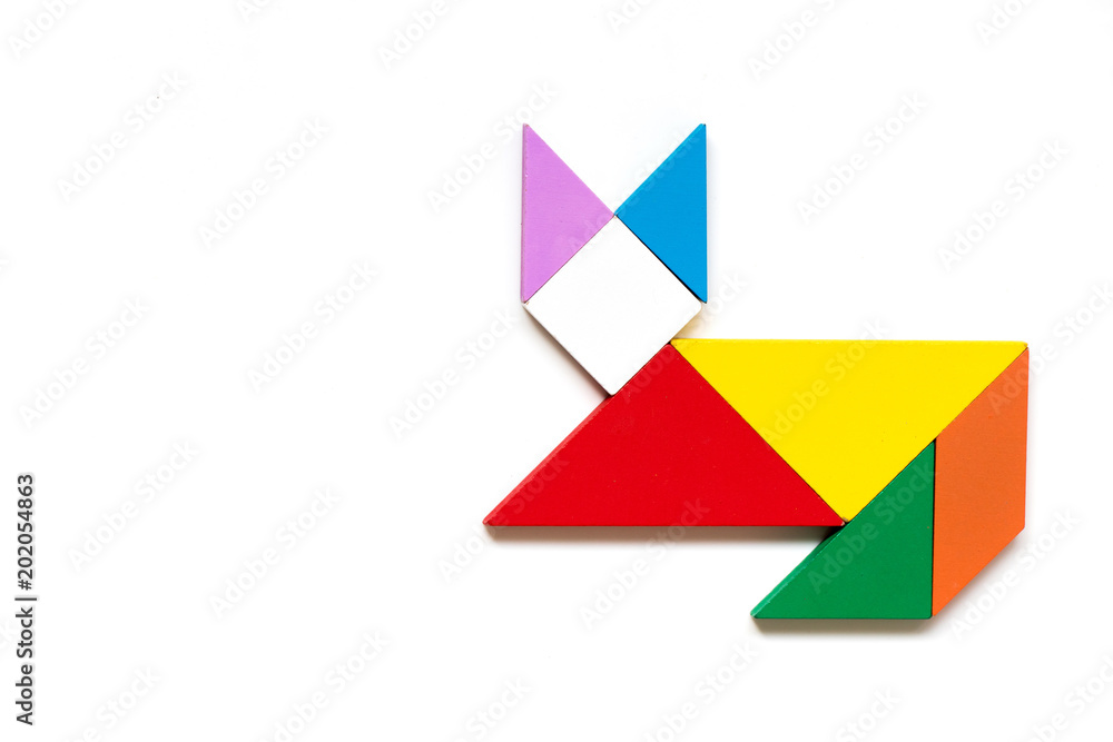 Color wood tangram puzzle in cat shape on white background Color wood tangram puzzle in cat shape on white background