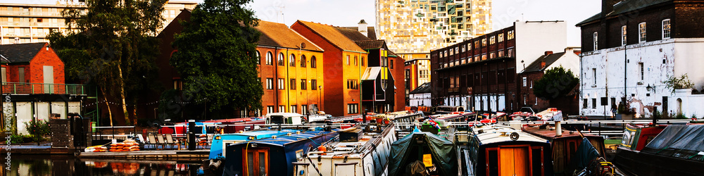 Boats moored in the evening at famous Birmingham canal in UK