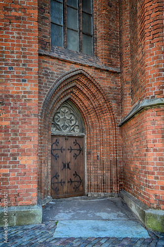 Entrance door of Medieval lutheran church  ancient Gothic architecture of Riga Dome Cathedral