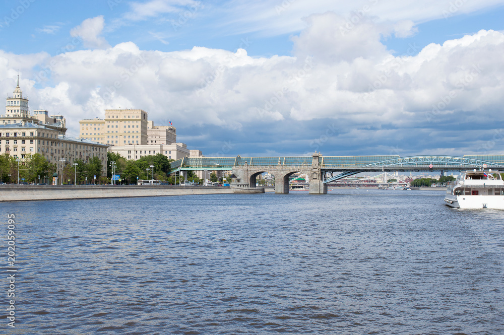 Summer view of Pushkinskiy bridge over Moskva river from river bus, Moscow, Russia, beautiful urban landscape with river