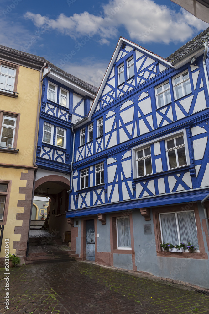 Ancient town Seligenstadt, Germany. Street of the old city. Colorful half-timbered houses. Ancient town Seligenstadt, Germany. Street of the old city. Colorful half-timbered houses.