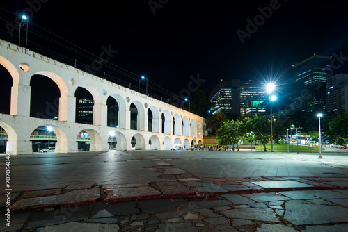 Famous Lapa Arches, Also Known as Carioca Aqueduct, at Night in Rio de Janeiro, Brazil photo