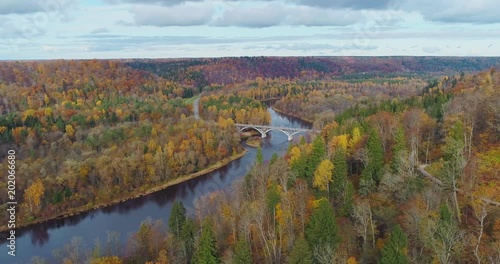 Autumn Forest Sigulda city nature, Gauya river drone flight, bridge car drive from above photo