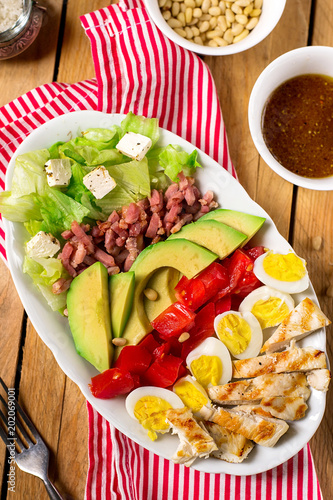 American garden salad Cobb salad with fresh vegetables and chicken