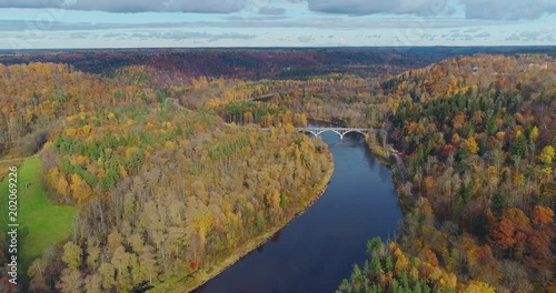Autumn Forest Sigulda city nature, Gauya river drone flight, bridge car drive from above photo