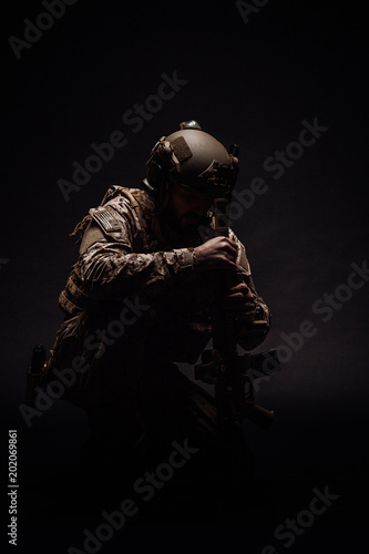 Special forces United States soldier or private military contractor. Image on a black background.