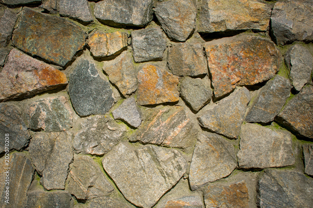 granite wall of stone pieces, background, mosaic granite wall of stone pieces, background, mosaic