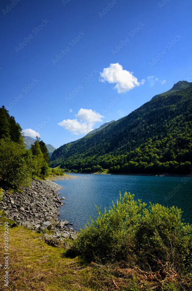 Fabreges lake in Ossau Valley in French Pyrenees. Fabreges lake in Ossau Valley in French Pyrenees.