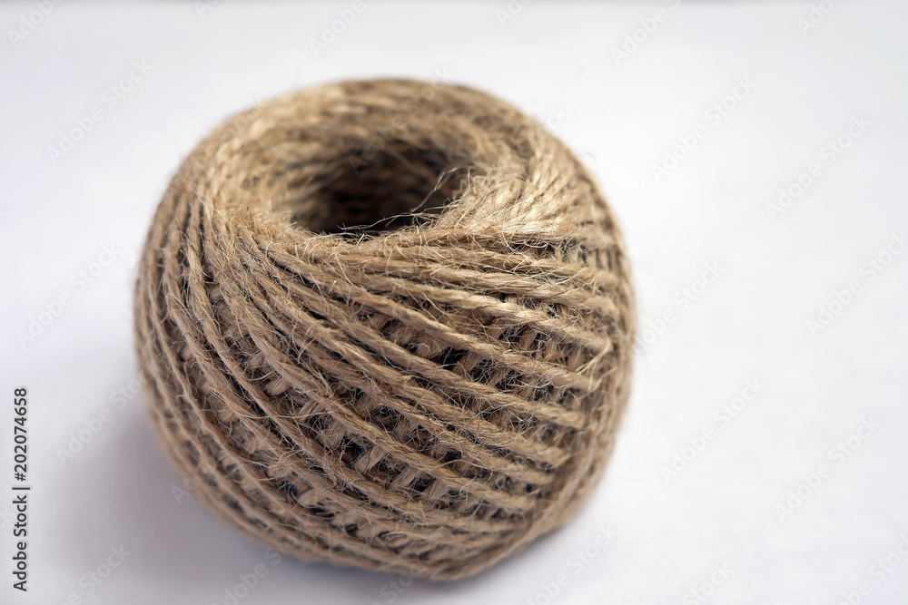 the texture of the twine strands in a tangle on a white background the texture of the twine strands in a tangle on a white background