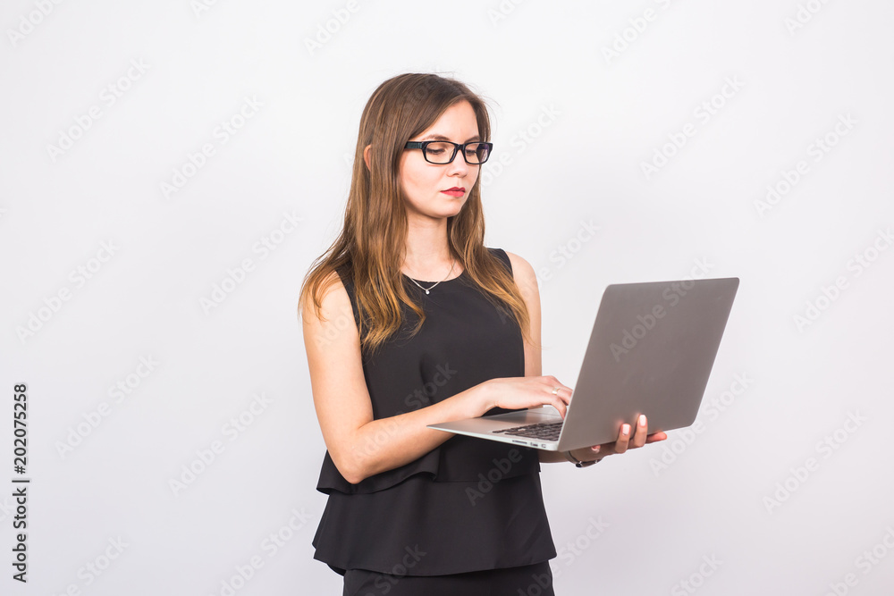Attractive mature businesswoman working on laptop. Attractive mature businesswoman working on laptop.