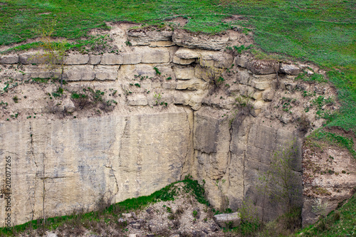 the Foundation of the old fortress, overgrown with grass photo