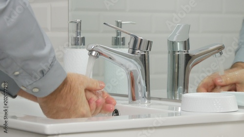 Man in Bathroom Wash His Hands with Fresh Water Daily Hygiene Activity