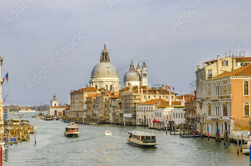 Panoramic view of Canal Grande with Basilica di Santa Maria della Salute in Venice, Italy at sunset, sunrise