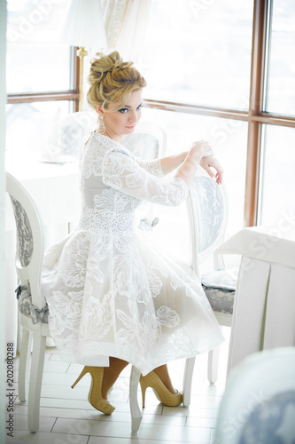 Beautiful bride sitting on a chair