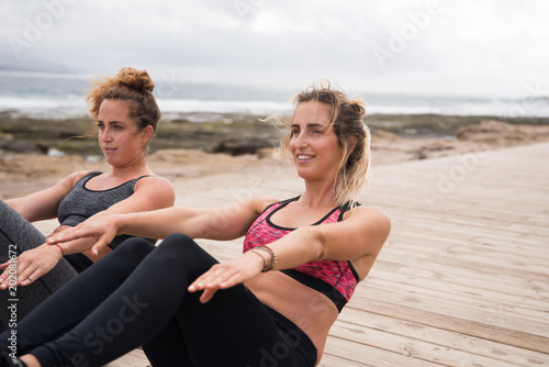 Two beautiful young women in excercise clothes